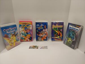 VHS Lot Space Jam W/ Coin , Care Bears Pagemaster Monsters Inc