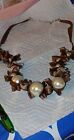 Chunky Faux Pearls On Brown Ribbon With Bows Necklace