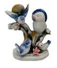 Vintage Porcelain Figurine of 3 blue birds sitting on a branch