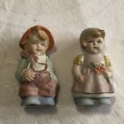 Vintage unglazed Salt and pepper shakers young boy and girl Made in Japan