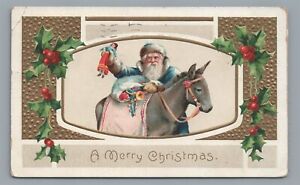 A Merry Christmas SANTA CLAUS Blue Suit Robe Donkey Blue Suit Vintage Postcard