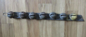 Antique 7 Sleigh Bells on leather strap