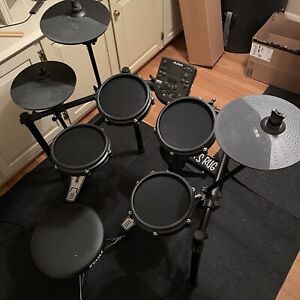 Alesis Nitro Mesh Electric Drum Kit w/ Throne & Rug