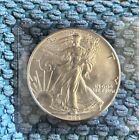 A - 1986 1 oz American Silver Eagle Brilliant Uncirculated Coin.