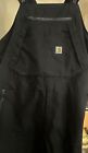 Used Carhartt men’s Storm Defender Overalls Black 2XL-Small Stain On Right Leg