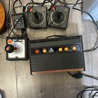 Vintage Atari Game System With Four Controllers