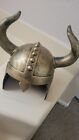 VIKING ANCIENT WAR HELMET WITH HORNS AND GOLD ANTIQUE FINISH.