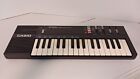 Casio PT-100 Electronic Musical Instrument Battery Powered Keyboard - Tested