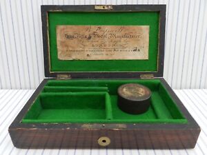 ANTIQUE ROSEWOOD FITTED PISTOL BOX WITH OLD EMPTY PERCUSSION CAP TIN & LABLE.