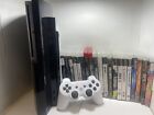 PS3 And 20 Game Lot