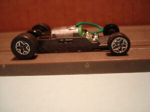 AFX RACING H.O. SCALE MEGA G+ 1.7 NARROW CHASSIS PAINTED CHROME STAR RIMS