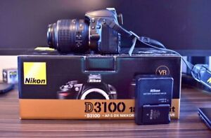 New ListingNikon D D3100 14.2MP Digital SLR Camera - Black (Kit w/ AF-S DX VR 18-55mm Lens)