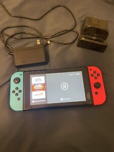 New ListingNintendo Switch 32GB  Console with Red and  Blue Joy-Con With Game And 1 TB Card
