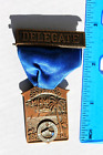 1948 NATIONAL ASSOCIATION OF LETTER CARRIERS CONVENTION DELEGATE, MIAMI FL BADGE