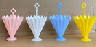 4 vintage hard plastic nut/candy cups in umbrella design, 3.5” tall