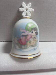 New ListingPRECIOUS MOMENTS CHRISTMAS FIGURINE BELL- GIRL ON SLED- DATED 1999