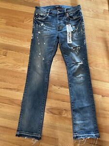 Purple Brand jeans P004 Flare/Boot. Released Hem, Indigo W/ Paint new with tags
