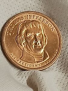 2007 P THOMAS JEFFERSON DOLLAR COIN. VERY LIGHTLY CIRCULATED.