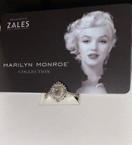 Limited edition Marilyn Monroe engagement ring w/ oval center cut diamond