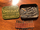 Chocolax 25 cents  tin /  Watch Parts and watch makers tool bits -  misc lot