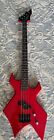 B.C. Rich Warlock Rave Series Bass w/EMG Pickups And Collapsing Stand.