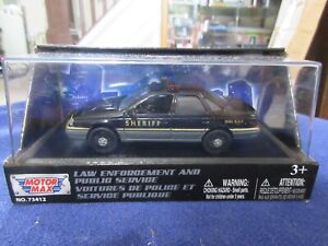 1:43 Motormax 1986 Ford Taurus Police Sheriff