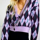 Urban Outfitters cropped lavender argyle v-neck sweater. Used condition. Small