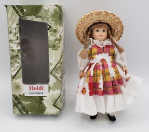 New ListingHeidi Switzerland Hand Made 6 In Porcelain Doll with Plastic Stand by Alberto SA