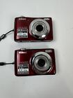Nikon COOLPIX L24 14.0MP Digital Camera Red Lot Of 2 WORKING BATTERY COVER LOOSE