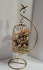 Bird Cage Decorative Gold Toned, hanging cage with stand. Filled with beautiful
