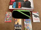 Nintendo switch with carrying case, three games and with Bluetooth audio adapter