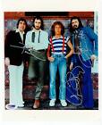 The Who 3x signed 8x10 photo Roger Daltrey Pete Townshend Entwistle PSA/DNA auto