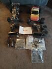 TRAXXAS BANDIT RC CAR AND RUSTLER RC TRUCK W/ CONTROLLERS CHARGER PARTS & TIRES
