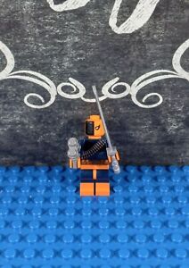 Lego Dc Deathstroke Minifigure 76034 Used-Good Condition with Swords and Gun.