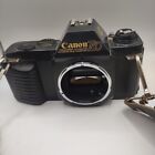 Canon T50 35mm SLR Film Camera. 50mm Canon Lens. 200mm TOYO Zoom Lens. Manuals.