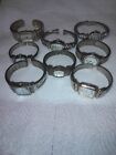 lot of 8 metal fixed cuff watches. Not working.