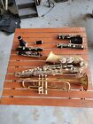lot of musical instruments for parts or repair