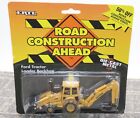 Ertl Ford Tractor Loader with Backhoe 1:64 Scale New on Card