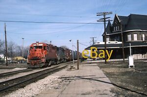 DT&I GP40-2 leads a GRAND TRUNK Freight in Durand, Michigan  1986 Railroad Slide