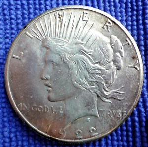 1922 s peace dollar very nice, light gold with good strike and flashy luster
