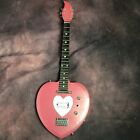 Pink heart-shaped electric guitar, factory customized, fast shipping