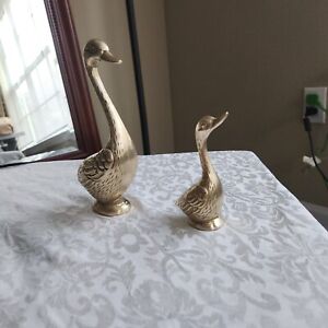 Two beautiful hand crafted lightly used vintage small brass geese figurines
