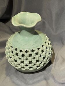New ListingPottery vase, 5.5” tall 4” wide. Green-grey color. Mesh overlayer.
