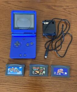New ListingNintendo Game Boy Advance SP Cobalt Blue AGS-001 w/ Charger + 3 Games