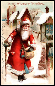 New ListingSanta Claus Walking Stick Snow Buildings mailed 1909 antique Christmas postcard