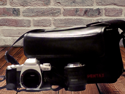 pentax camera zx-50 with camera bag and Pentax 35-80mm f4-5.6 lens F SMC Pentax-