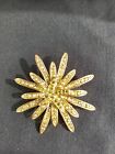 Vintage Gold Tone Starburst Flower Brooch with Peridot and AB Colored Crystals