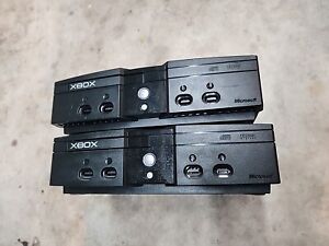 Lot of 2 Original Xbox Console System Only For Parts, Sold AS IS Powers On