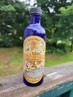 EARLY CRABTREE AND EVELYN EAU DE ROSE NATURAL ROSE WATER IN BLUE GLASS BOTTLE