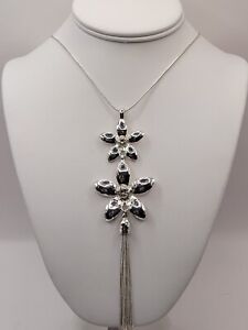 Striking Silver Tone Long Necklace With Floral Pendant and Chain Tassel (D)